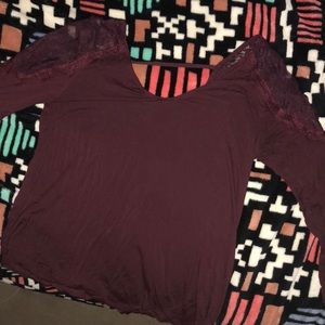 Maroon long sleeve shirt.